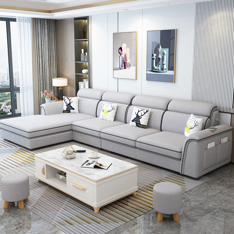 現代的なリビングルームの静止したくぼんだ腕のクッションシート