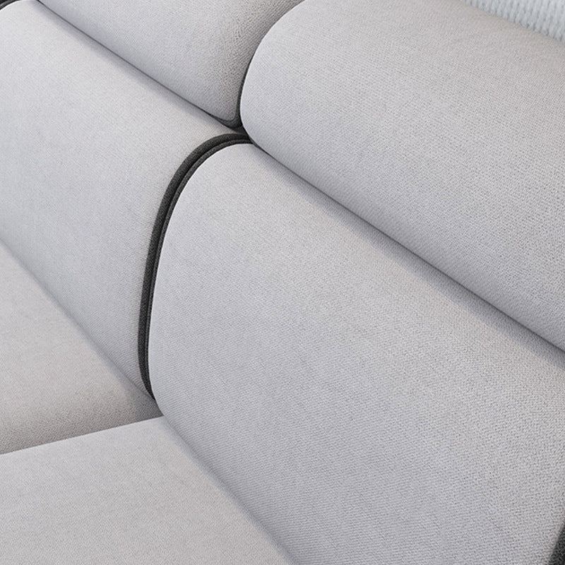 現代的なリビングルームの静止したくぼんだ腕のクッションシート