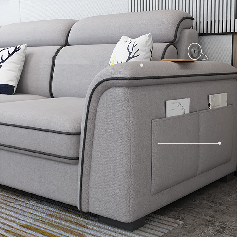 現代的なリビングルームの静止したくぼんだ腕のクッションシート