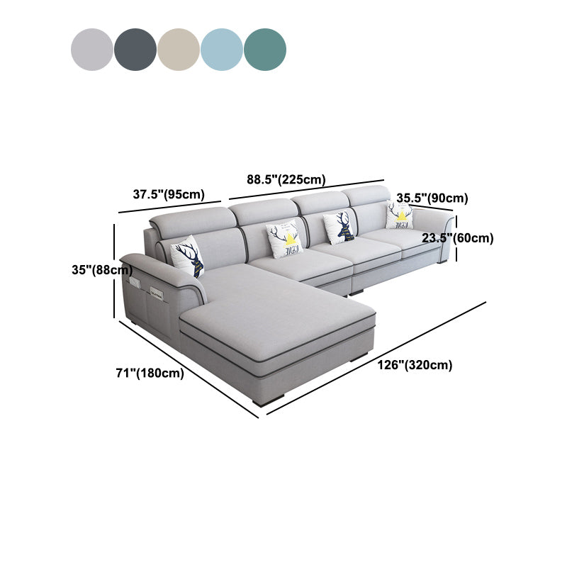 現代的なリビングルームの静止したくぼんだ腕のクッションシート