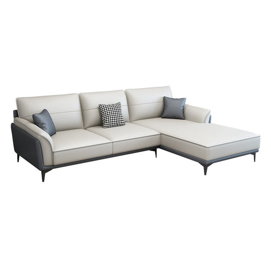 Divano e chaise di divano armato svasato in fenomeno in cuscino in pelle.