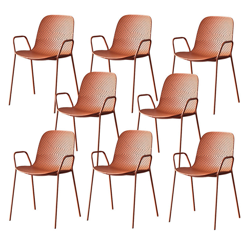 Silla de brazo de estilo contemporáneo silla de comedor de plástico con base de metal