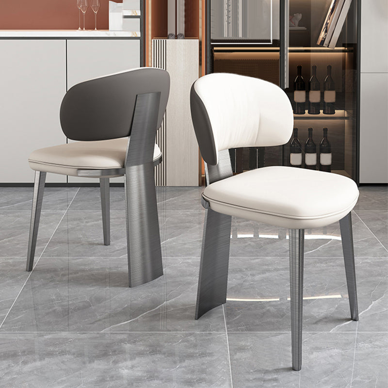 Glam -eetkamerstoel faux leer en metalen armloze eetkamerstoelen