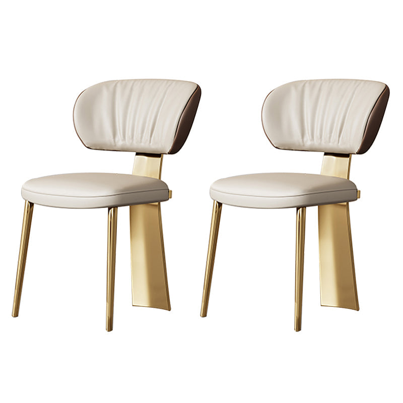 Glam -eetkamerstoel faux leer en metalen armloze eetkamerstoelen