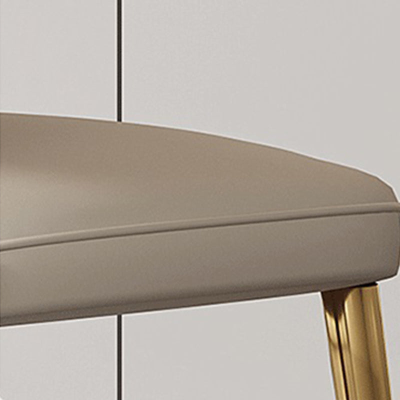 Glam -eetkamerstoel faux leer en metalen armloze eetkamerstoelen