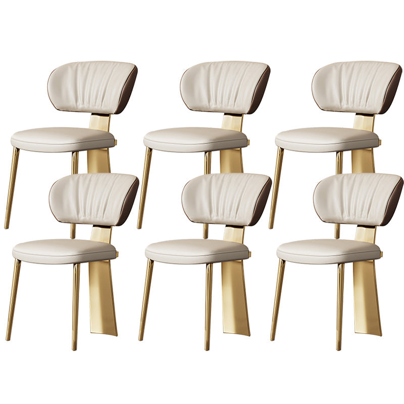 Glam -eetkamerstoel faux leer en metalen armloze eetkamerstoelen