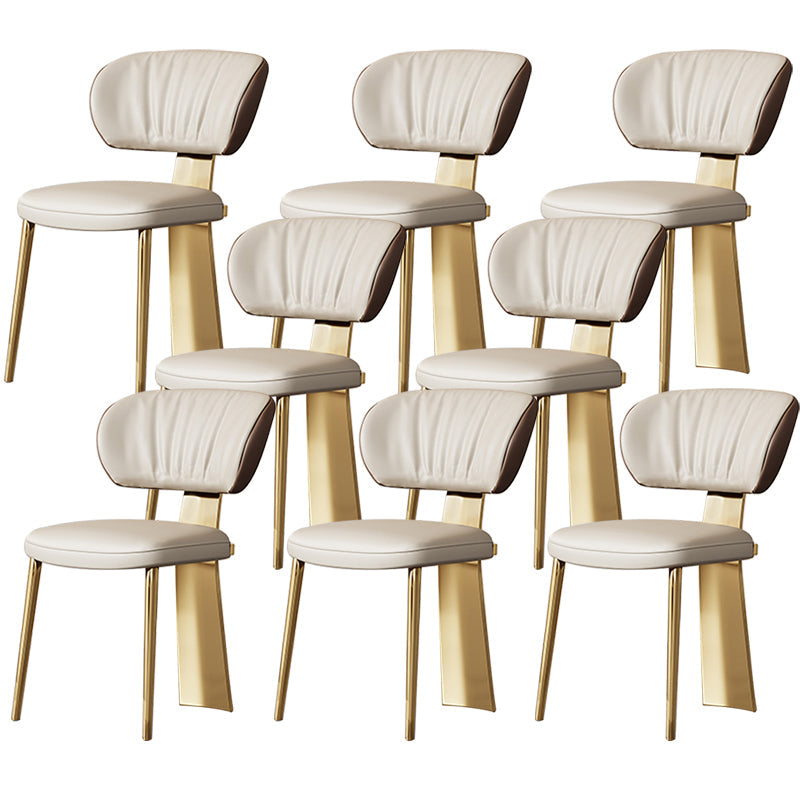 Glam -eetkamerstoel faux leer en metalen armloze eetkamerstoelen