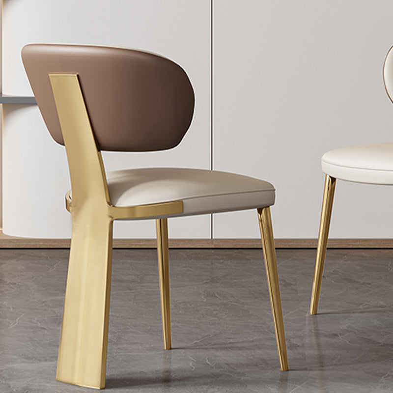 Glam -eetkamerstoel faux leer en metalen armloze eetkamerstoelen