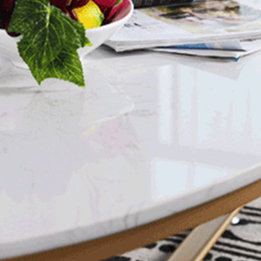 Tavolo da cocktail in stile glam con top ovale e base a croce di ferro dorato