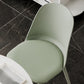 Chaise de salle à manger sans bras rembourrée moderne avec base en métal