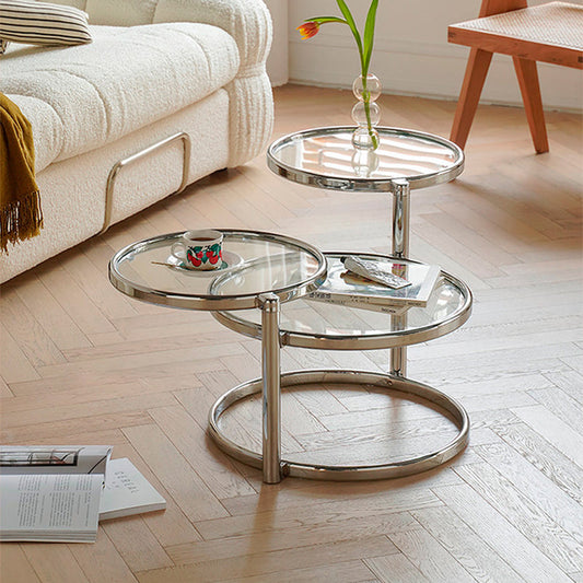 ガラスの丸いトップとステンレス鋼のベースを備えた拡張可能なコーヒーテーブル