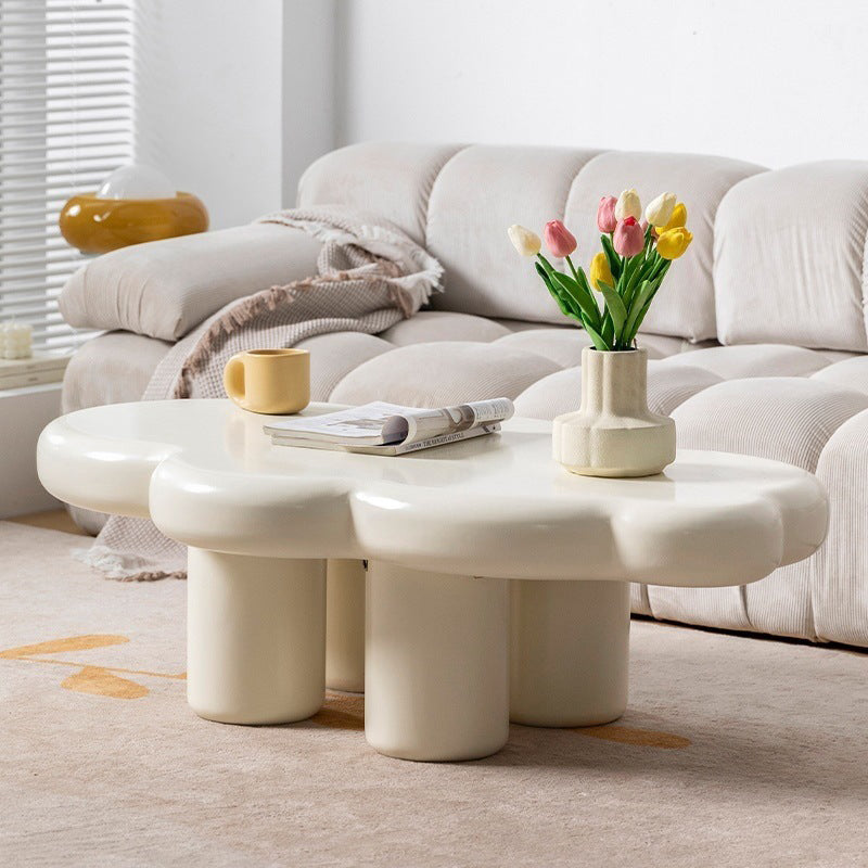 Zeitgenössischer weißer Couchtisch in freier Form mit 4 Holzbeinen