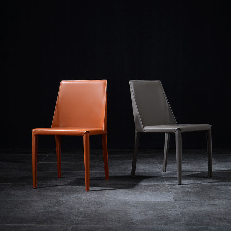 Eigentijdse faux lederen eetstoelen gestoffeerde parsons zijstoel