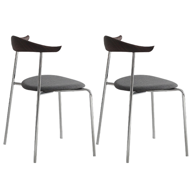 Moderne stijl gestoffeerde armloze stoel lederen eetkamerstoel met metalen basis