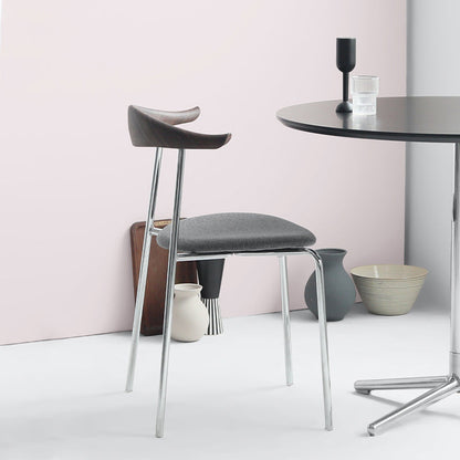 Moderne stijl gestoffeerde armloze stoel lederen eetkamerstoel met metalen basis