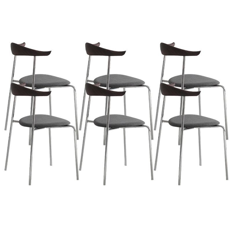 Moderne stijl gestoffeerde armloze stoel lederen eetkamerstoel met metalen basis