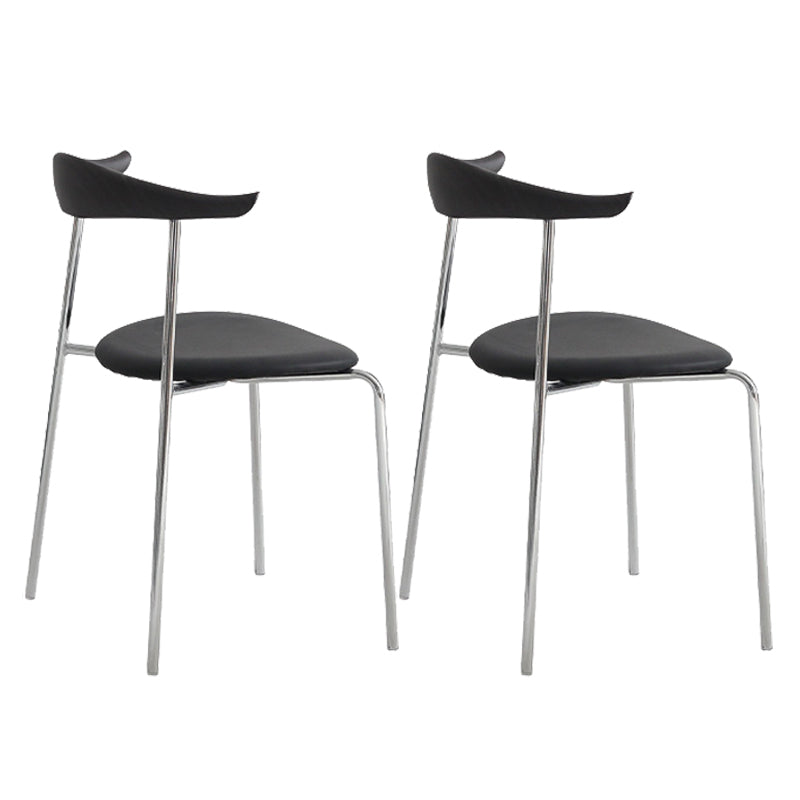 Moderne stijl gestoffeerde armloze stoel lederen eetkamerstoel met metalen basis