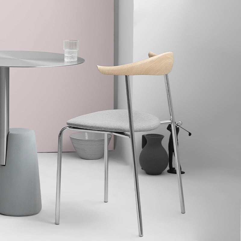 Moderne stijl gestoffeerde armloze stoel lederen eetkamerstoel met metalen basis