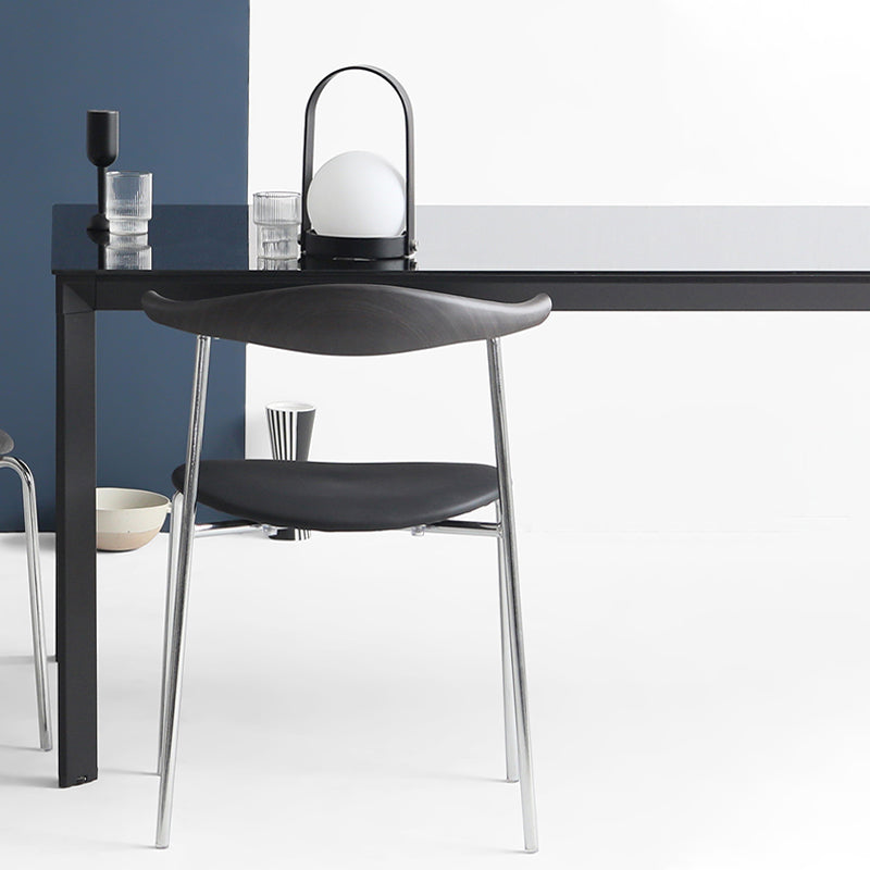 Moderne stijl gestoffeerde armloze stoel lederen eetkamerstoel met metalen basis