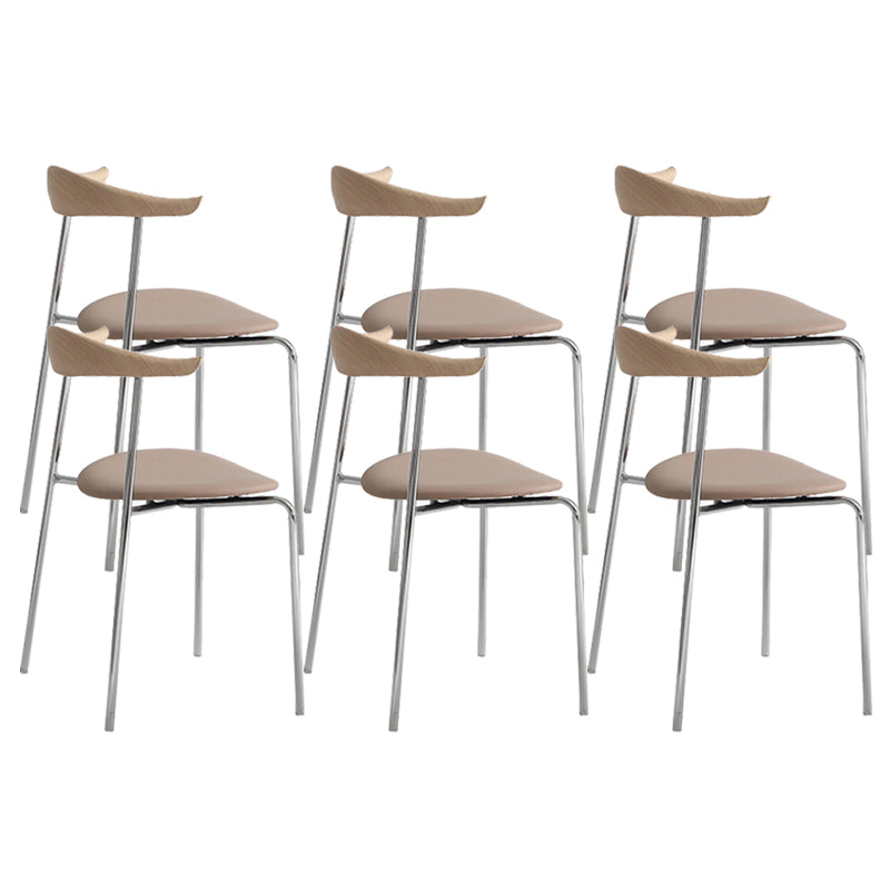 Moderne stijl gestoffeerde armloze stoel lederen eetkamerstoel met metalen basis