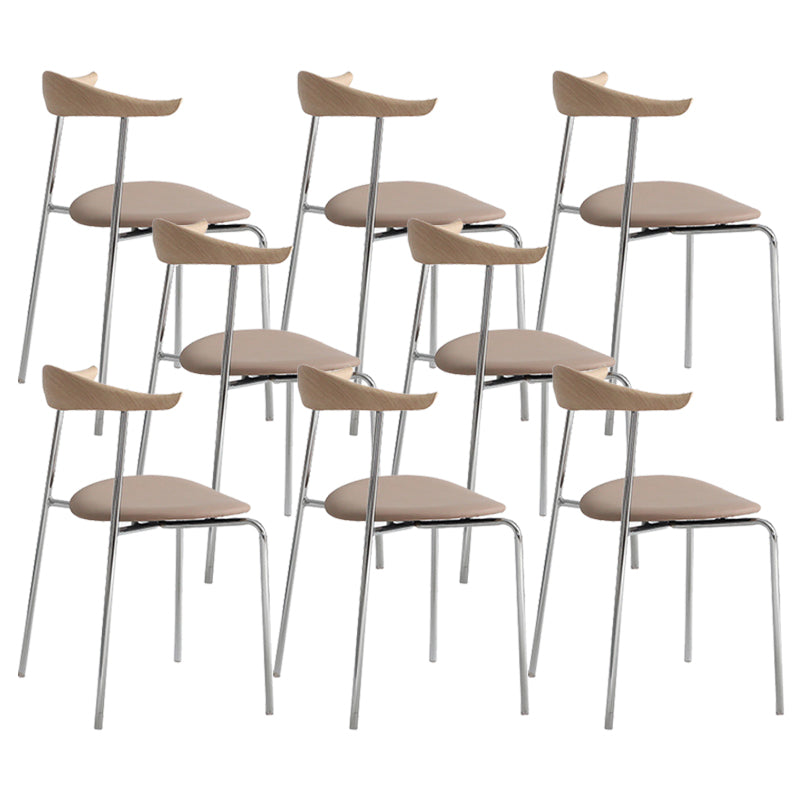 Moderne stijl gestoffeerde armloze stoel lederen eetkamerstoel met metalen basis