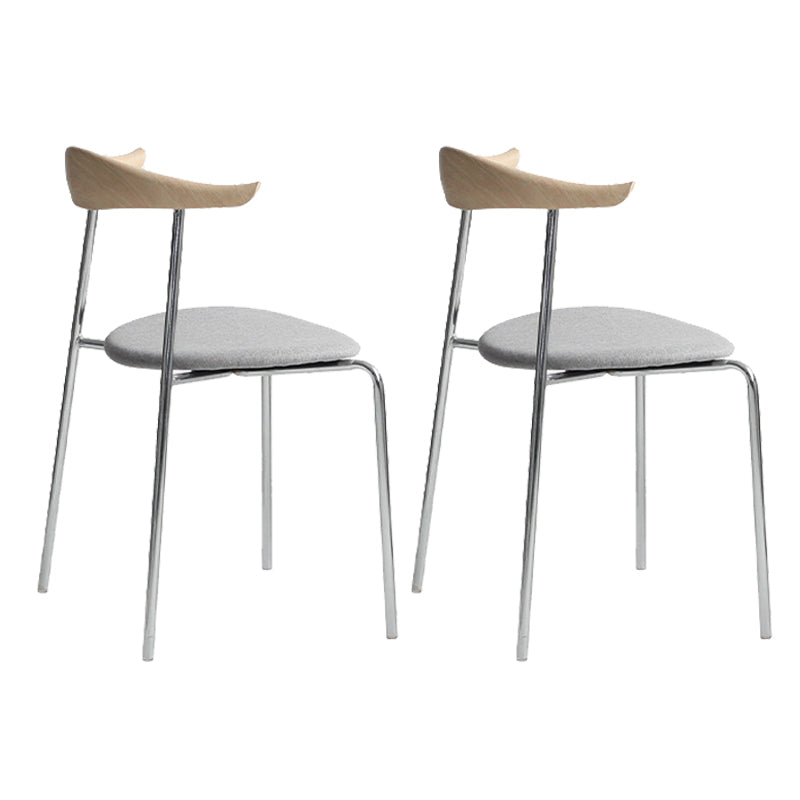 Moderne stijl gestoffeerde armloze stoel lederen eetkamerstoel met metalen basis