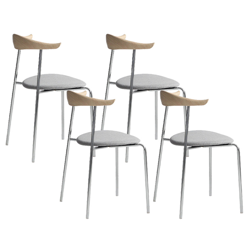 Moderne stijl gestoffeerde armloze stoel lederen eetkamerstoel met metalen basis