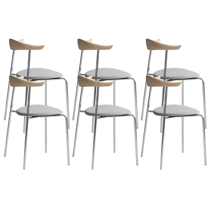 Moderne stijl gestoffeerde armloze stoel lederen eetkamerstoel met metalen basis