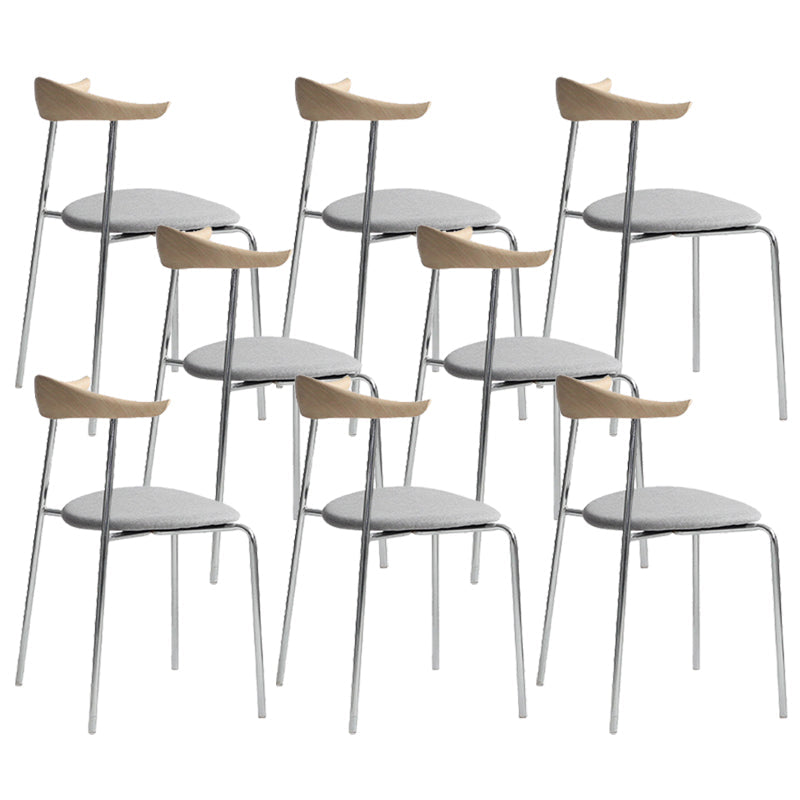 Moderne stijl gestoffeerde armloze stoel lederen eetkamerstoel met metalen basis