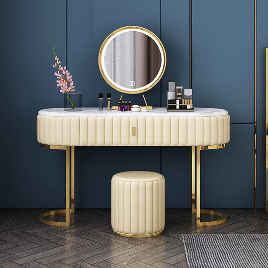 Tavolo da toeletta ovale top in pietra glam con tavolo da trucco a base di metallo