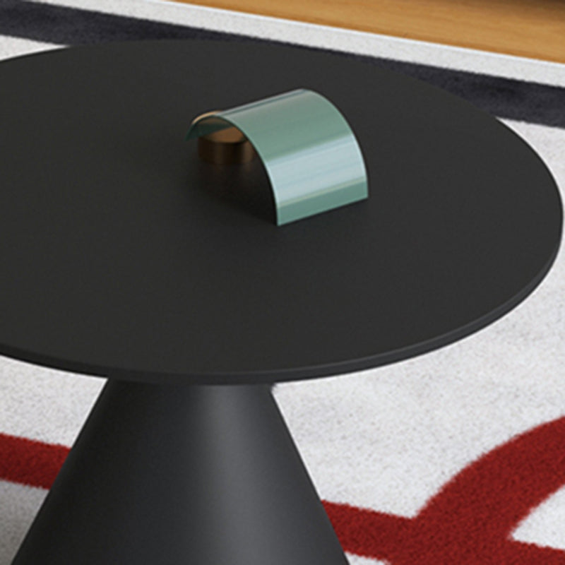 Moderne zwart/witte salontafel met ronde bovenkant, ijzeren voetstuk, cocktailtafel uit het midden van de eeuw