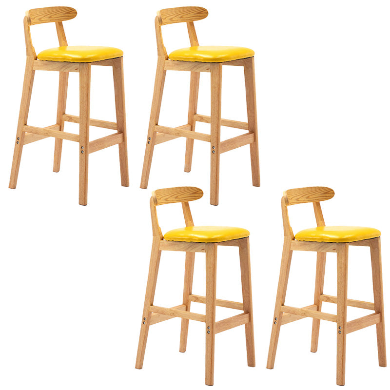 Industrial Armless Backrest Counter Stool Rubber Wood Cafe Bar Stool with Pedal Yellow 4 Piece Set Clearhalo 'Bar Furniture' 'Bar Stools' 'bar_stools' 'furn' 'furn_bar_stools' 'Furniture' 'Kitchen & Dining Furniture' 6186281