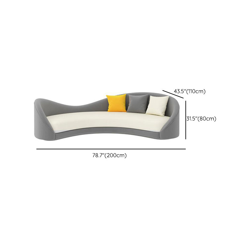 現代的な傾斜腕湾曲ソファーフェイクレザーラクダバックソファ