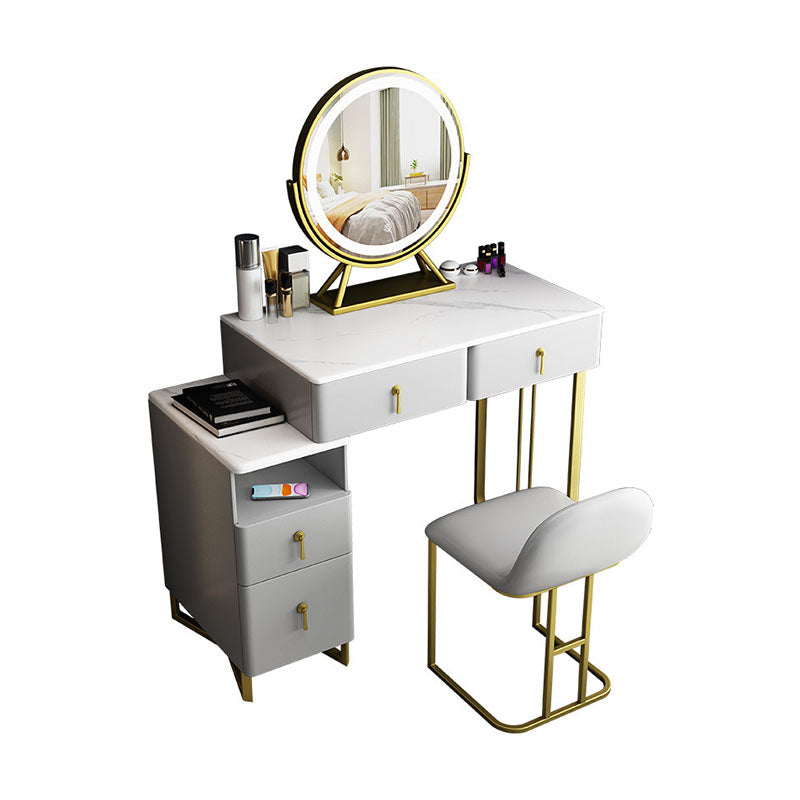 Tavolo da vanità glam con 4 cassetti e base dorata e top in pietra