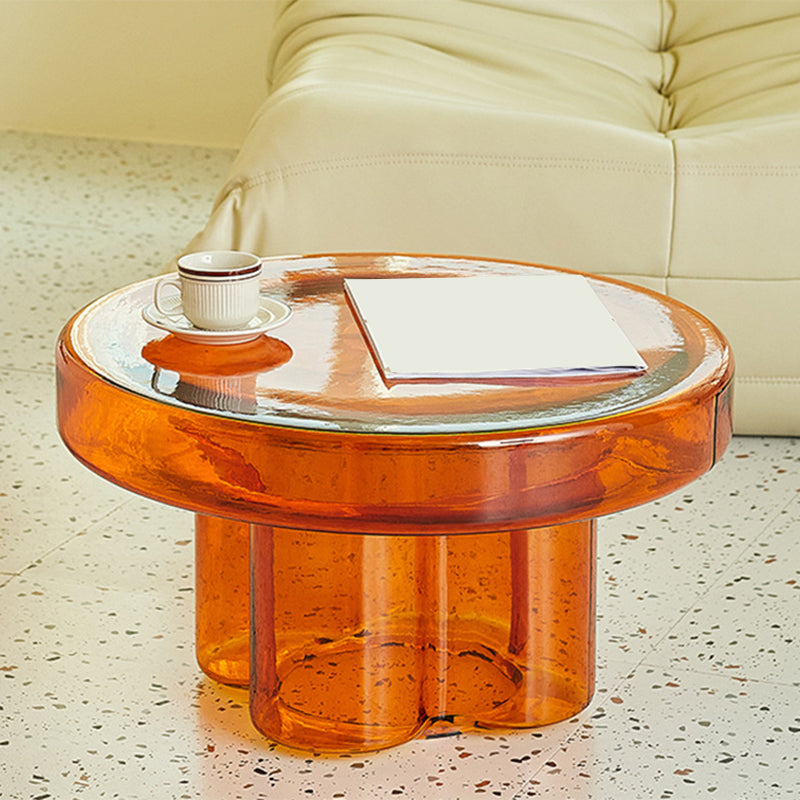 Moderner Couchtisch aus Klarglas mit Sockel, runder, schlichter Cocktailtisch