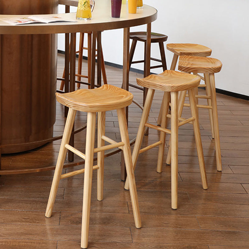 Taburete de bar de madera sin respaldo moderno con pedal y asiento de madera
