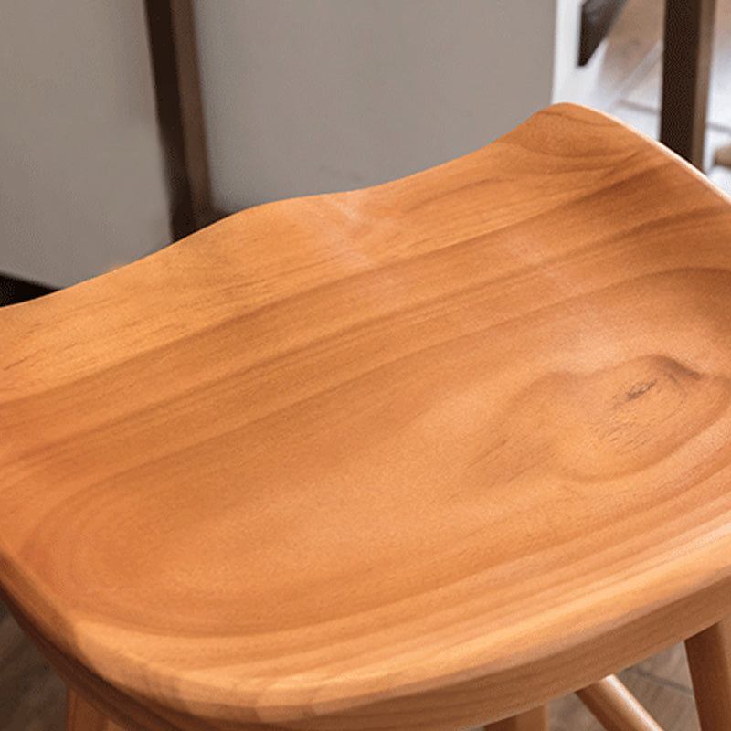 Taburete de bar de madera sin respaldo moderno con pedal y asiento de madera