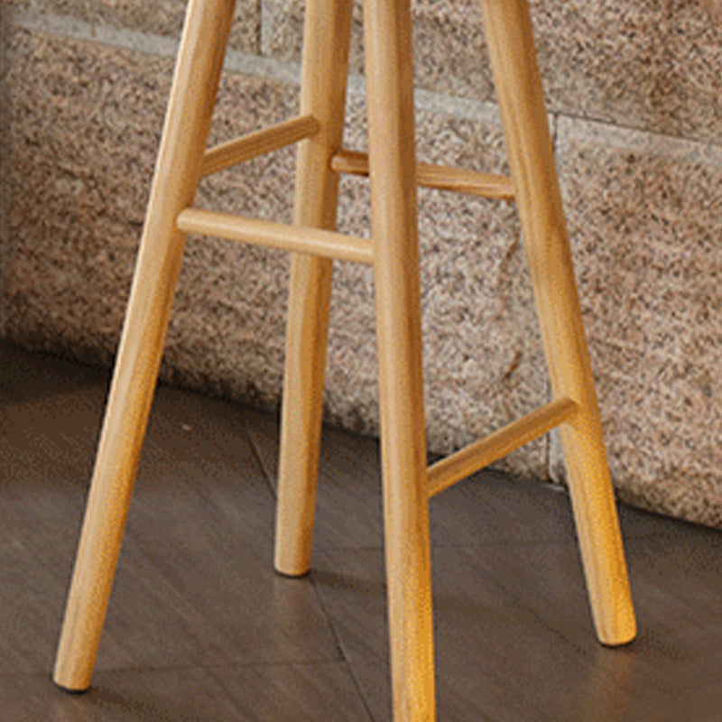 Taburete de bar de madera sin respaldo moderno con pedal y asiento de madera