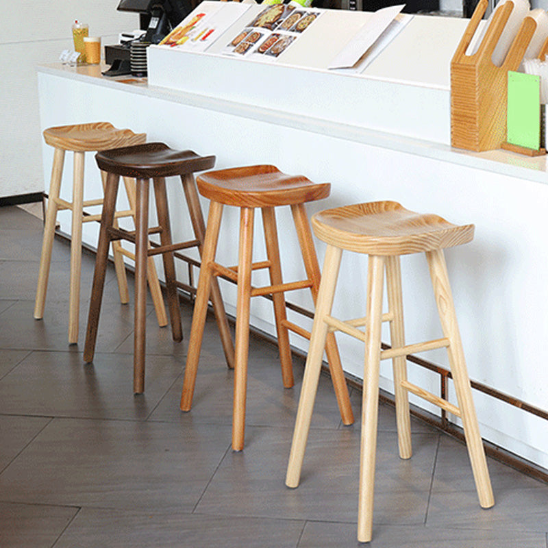 Taburete de bar de madera sin respaldo moderno con pedal y asiento de madera