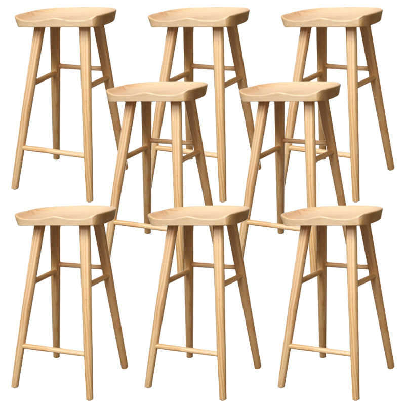 Taburete de bar de madera sin respaldo moderno con pedal y asiento de madera