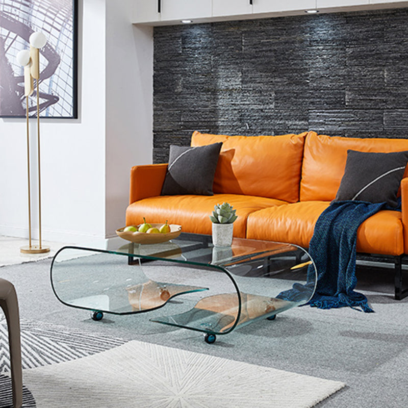 Geometric Glass Coffee Table with Casters Contemporary Shelf Included Cocktail Table 47"L x 25.5"W x 16"H Clear Clearhalo 'Coffee & Accent Tables' 'Coffee Tables' 'coffee_tables' 'furn' 'furn_coffee_tables' 'Furniture' 'Living Room Furniture' 6254465