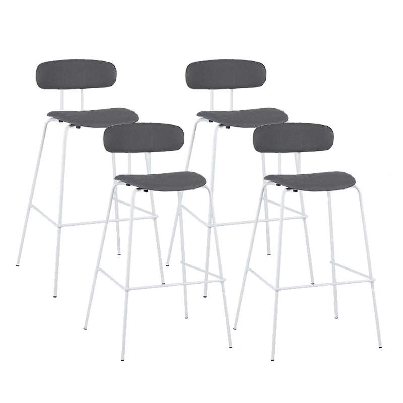 Taburete de bar tapizado de cuero sin brazos con respaldo moderno y base de metal