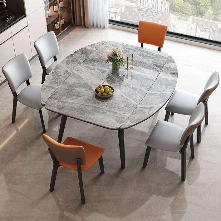 Tavolo da pranzo moderno allungabile in pietra con base in legno per sala da pranzo