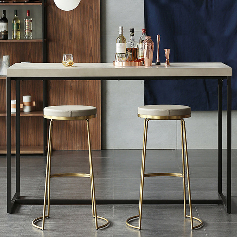 Tabouret de comptoir rond en similicuir moderne, sans dossier, avec repose-pieds