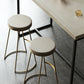 Tabouret de comptoir rond en similicuir moderne, sans dossier, avec repose-pieds