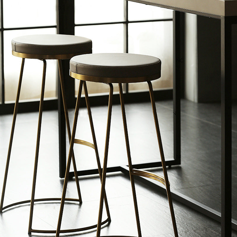 Tabouret de comptoir rond en similicuir moderne, sans dossier, avec repose-pieds