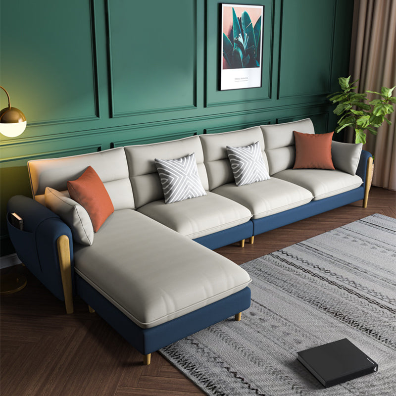 Divano sezionale del braccio rotondo con ottoman sezionale in pelle finta
