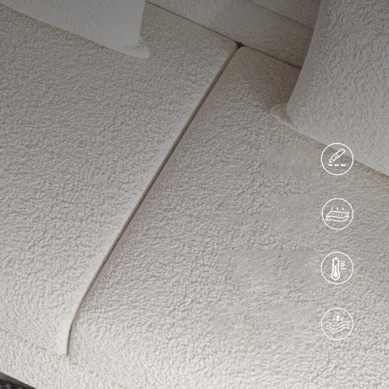 Moderne witte wollen bank met smokingarm en strakke rug voor appartement