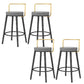Glam Style Armless Counter Stool Faux Leather Round Bar Stool Black-Gold 4 Piece Set Short Stool(22"H) Clearhalo 'Bar Furniture' 'Bar Stools' 'bar_stools' 'furn' 'furn_bar_stools' 'Furniture' 'Kitchen & Dining Furniture' 6316984
