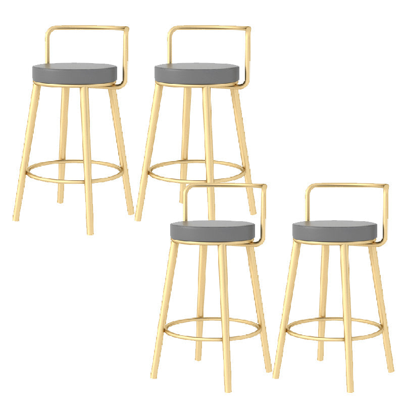 Glam Style Armless Counter Stool Faux Leather Round Bar Stool Gold 4 Piece Set Short Stool(22"H) Clearhalo 'Bar Furniture' 'Bar Stools' 'bar_stools' 'furn' 'furn_bar_stools' 'Furniture' 'Kitchen & Dining Furniture' 6316988